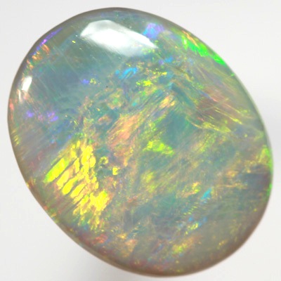 SOLID SEMI BLACK OPAL Bright orange, green and yellow over blue. SEE VIDEO